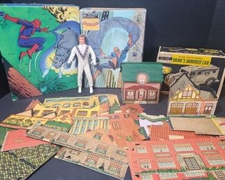 Two vintage Spiderman puzzles, cannot verify if all pieces are there. Cardboard town comes with school, fire station, Union Station, church, drug store and homes. Evel Knievel is bendable and made of rubber, measures 7" tall. Brinks armored car box does not have toy in it. https://ctbids.com/#!/description/share/955273