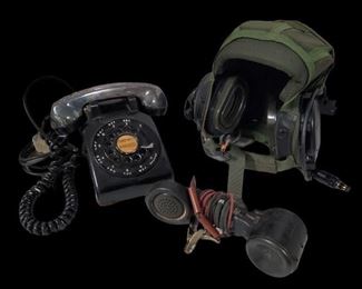Black Western Electric Rotary Telephone with silver headset. Measures 9"L x 5"H x 9"W.
Vintage linemen phone and a military helicopter pilot headset.