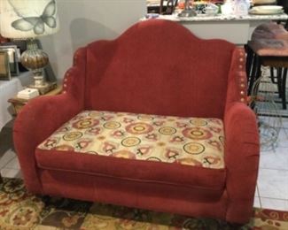 Loveseat with seat cushion that reverses to a solid color, cute lamp with butterfly shade