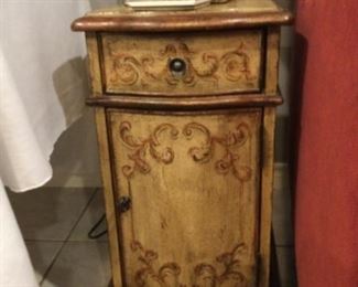 Side table with decorative paint finish