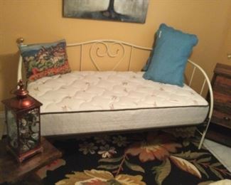 White metal trundle bed with like new mattress