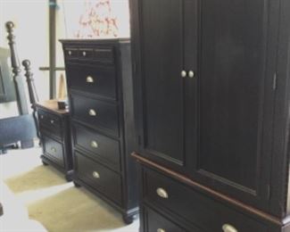 Armoire/Media cabinet, chest of drawers, and nightstand in black finish