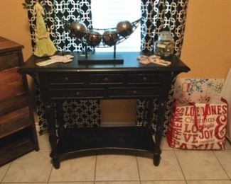 Side table in black finish with storage drawers and shelf - great for displaying collectibles