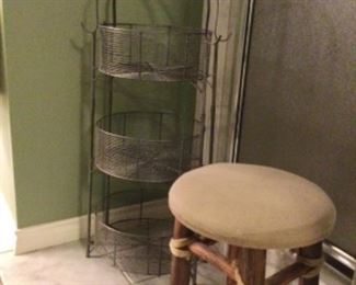 Tiered storage tower in pewter finish; rustic upholstered stool