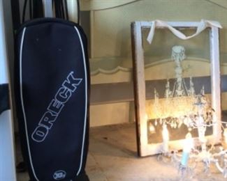 Oreck vacuum cleaner; Shabby chic lighted chandelier with etched glass wooden window