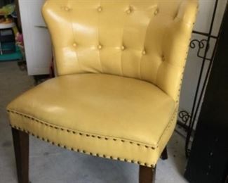 Vinyl covered tufted side chair