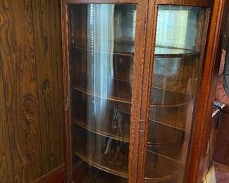 Curved glass China cabinet 