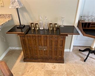 Nice bar / server on wheels. 