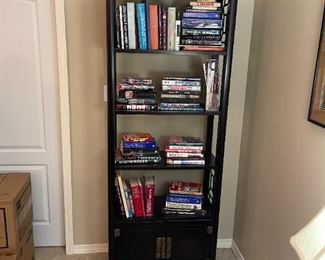 Black Asian style bookcase with nice selection of HB books
