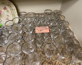 Kitchen is full, some very nice Mid Century Modern silver rimmed fine crystal. 