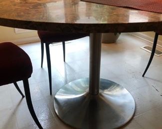 Vintage Saarinen Dining Table w/ Brown Marble Top.  This Was Purchased From Gorman's And We Will Verify It's Authenticity And Update This Listing Upon Verification.  The Brown Marble Top Does Have A Crack That Was Repaired.  4  Modern Chairs With Blond Wood Backs & Fabric Seat & Metal Legs 