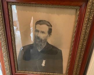 Portrait of man wearing  a Grand Army of The Republic Medal 1861-1866
