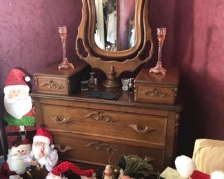 Walnut dresser, matching bed also from the Hamilton Family surrounded by Santa’s 