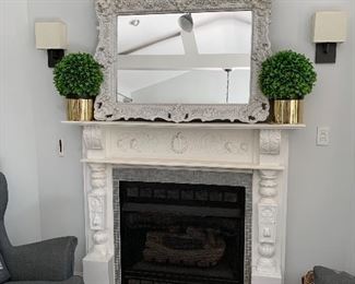 This Victorian looking frame with a  traditional scoop and ornate ruffled edge ornamentation and antique white finish adds a special touch to any room.