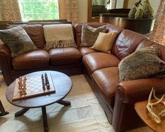 Game night will never be as comfortable as when you gather in this Lillian August Leather Sectional                89” Right L, 89” Left L
18” H from ground, 36” H floor to back cushion, 36” D
