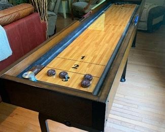 All season fun with this indoor shuffleboard table.