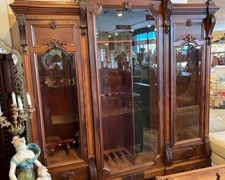 Large antique French cabinet that was converted into a gun cabinet. There are additional pieces that go on the top. This piece takes your breathe away when you see it! 