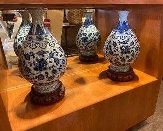 Large pair of vintage Chinese vases on carved wood stands