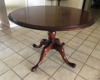 Mahogany round table with cabriole legs. Jasper, IN. 42" round, 29.5h. $250, delivery and shipping available pls enquire.
