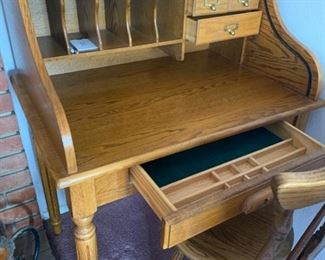 SOLD. Roll-top desk with the slide open. Handy storage and lots of organizing possibilities. 