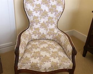 In excellent condition 19th C high back arm chair with porcelain castors $300