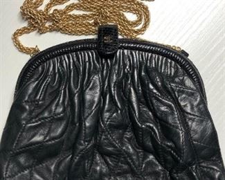 Rare vintage Chanel "quilted" lambskin bag, top over-clasp; black interior; single zip interior pocket; chain link shoulder strap (19" drop). Very good condition. Shipping available. $1,450