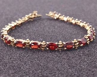 Charming Oval Cut Garnet Tennis Bracelet

