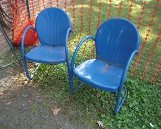 pair old metal lawn chairs