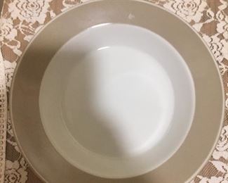 Adagio taupe was designed by Niels Refsagaard and features a wide taupe band on the rim. It is part of the Concerto line and was produced from 1986 to 1987. Rare and hard to find in any condition, this vintage soup bowl is unused and in pristine condition.