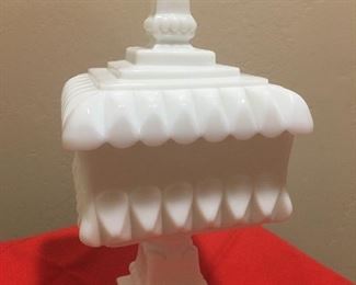 Sometimes referred to as a milk glass candy dish with lid and something’s called a wedding bowl this is a very beautiful, heavy dish. No defects. From family estate has been in storage many years belonged to a great great aunt.