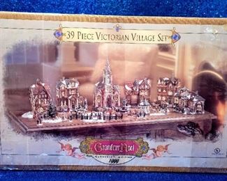 Item # 120 -"1999 Grandeur Noel Christmas Victorian Village" - includes all the buildings, gazebo, fountain and Ice Rink Park - Beautiful, no chips or cracks - $150 for all, box included. Text 205-567-5509 for individual pics of buildings
