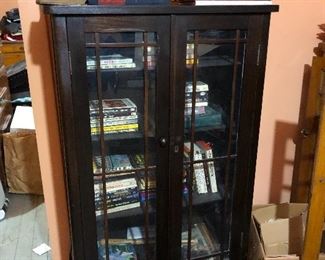 Antique cabinet and books
