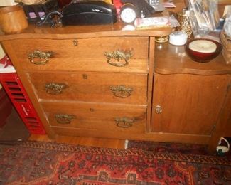 Antique chest with a step down shelf and cabinet
