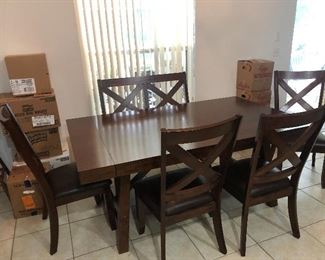 6 chairs and two table extenders