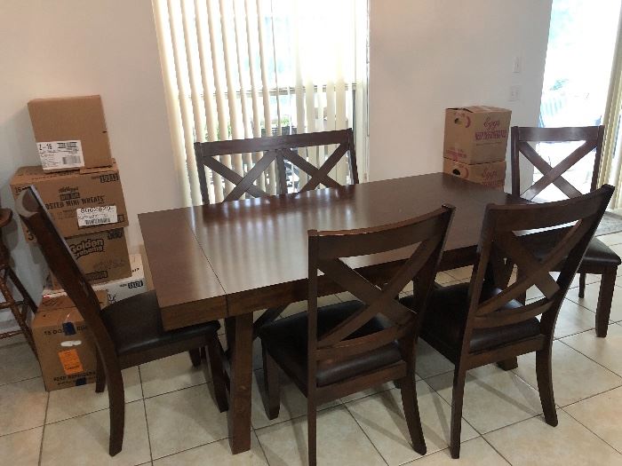 6 chairs and two table extenders