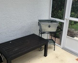 Outdoor table and antique cooler