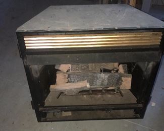 Fireplace insert with gas logs