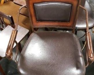 (2) Upscale Wrought Iron Swivel Brown Vinyl With Wood Bar Armchairs (1 chair has a ripped seat in front) WAS $275  NOW $250