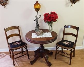 c 1875 Renaissance Revival Walnut Table along with 2 Needle Point Chairs and Figural Lamp