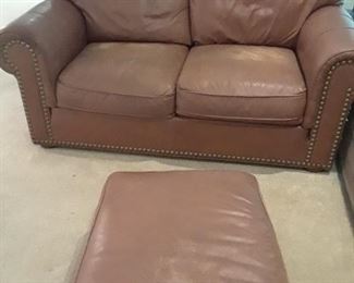 Leather loveseat and full length hassock