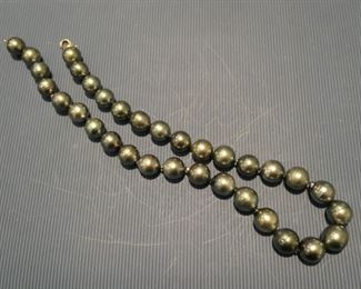 South Sea grey cultured pearls 15mm with gold clasp. Ear studs not shown.