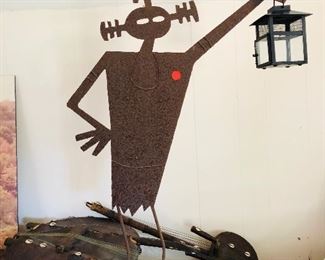 “Mudman Travolta” metal art