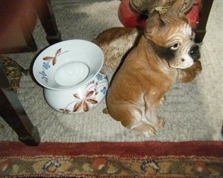 A ladies spittoon  hack up a big goober of tobacco and spit then wipe your chin.The good old days.