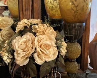 Floral arrangement and one of two matching lamps
