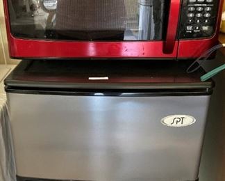 Red microwave; small refrigerator
