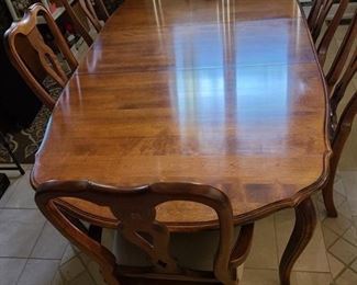 Ethan Allen Dining Table, 4 Side Chairs, 2 Arm Chairs. Table measures 84 x 44 without leaves. Adding two 18 " leaves makes it 102" long. Comes with full set of table pads.