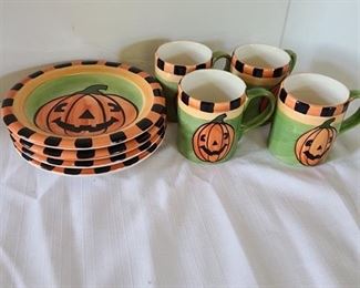Halloween plates and mugs, eight pieces