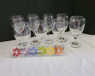 Assorted goblets, wine glasses and glass clips