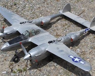 85 - Silver model airplane 40 x 29
