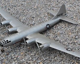 100 - Silver model plane 38 x 52 1/2
